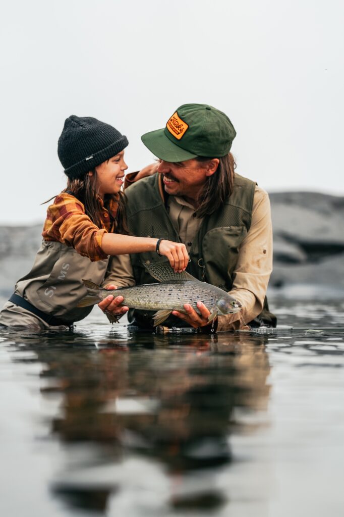Fishing in the Great Slave Lake. Arctic Gralying. Image Hoóke