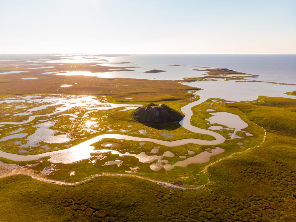 A pingo by the arctic ocean in the northwest Territories