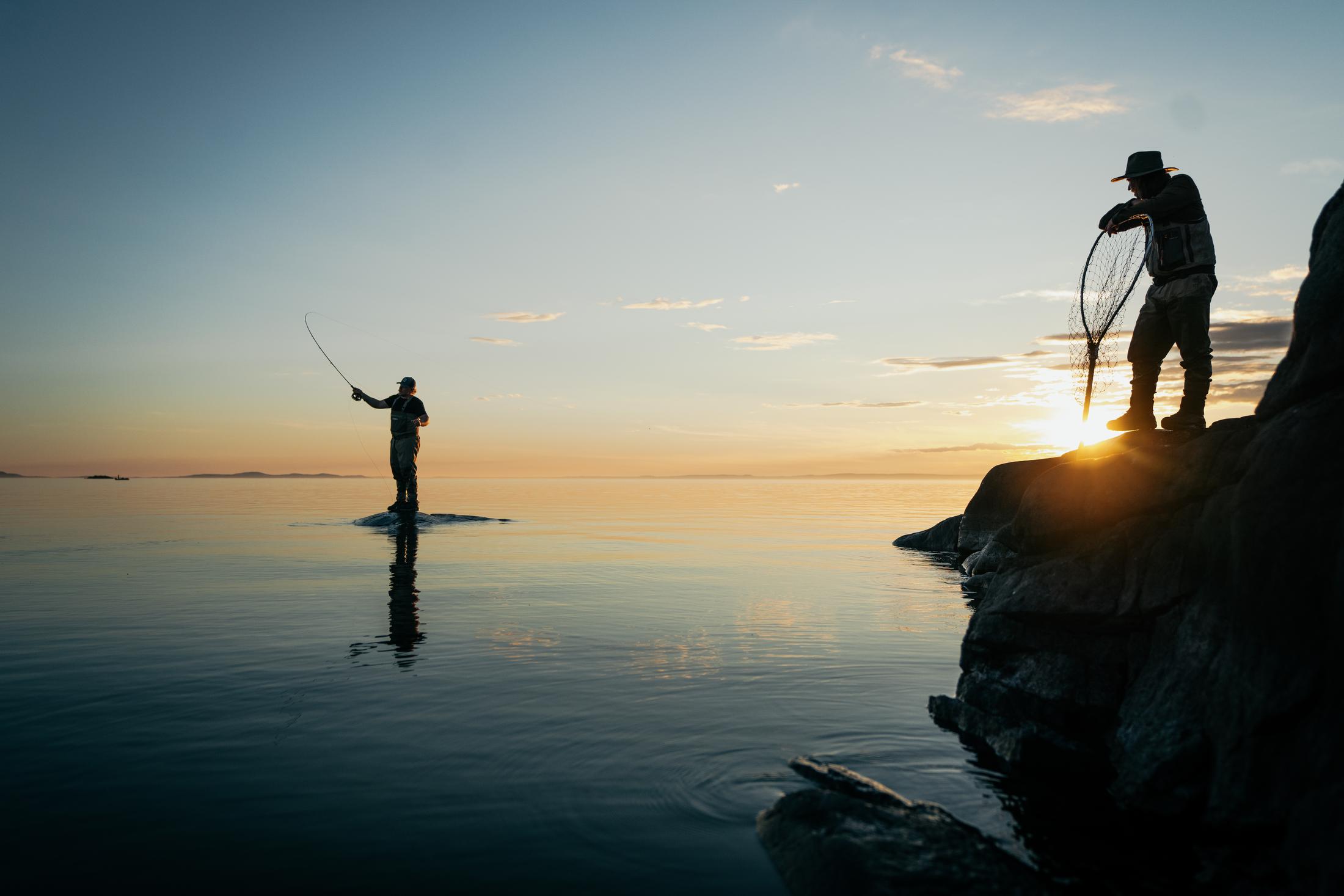 People Fly Fishing in Thaidene Nene National Park Reserve int eh NWT